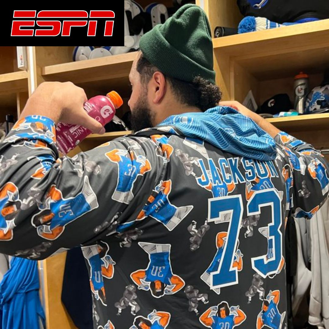 Jonah Jackson wearing a Plover Robe in the Lions locker room